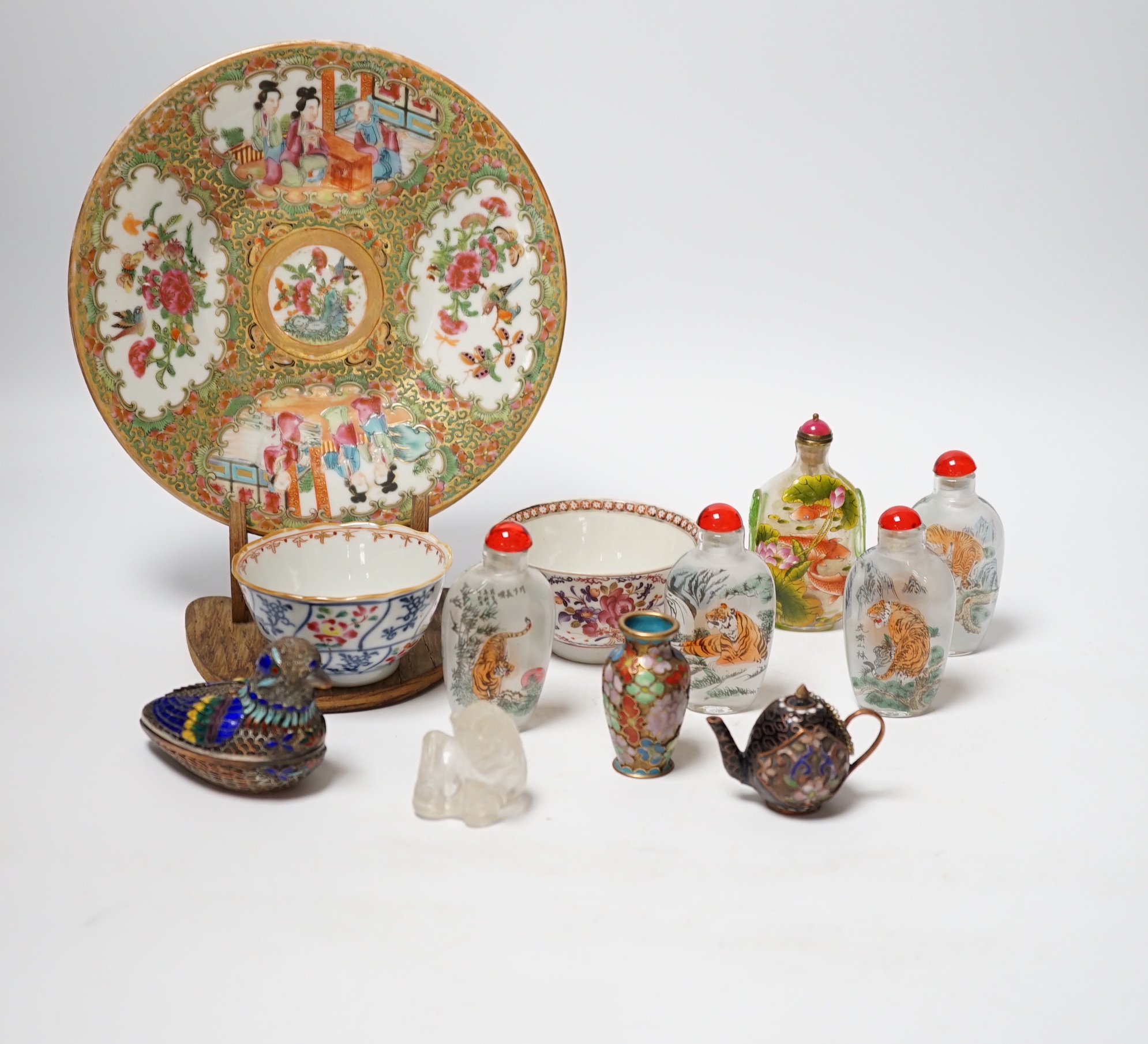 A collection of mixed Chinese scent bottles a famille rose plate and two tea bowls together with various Japanese items